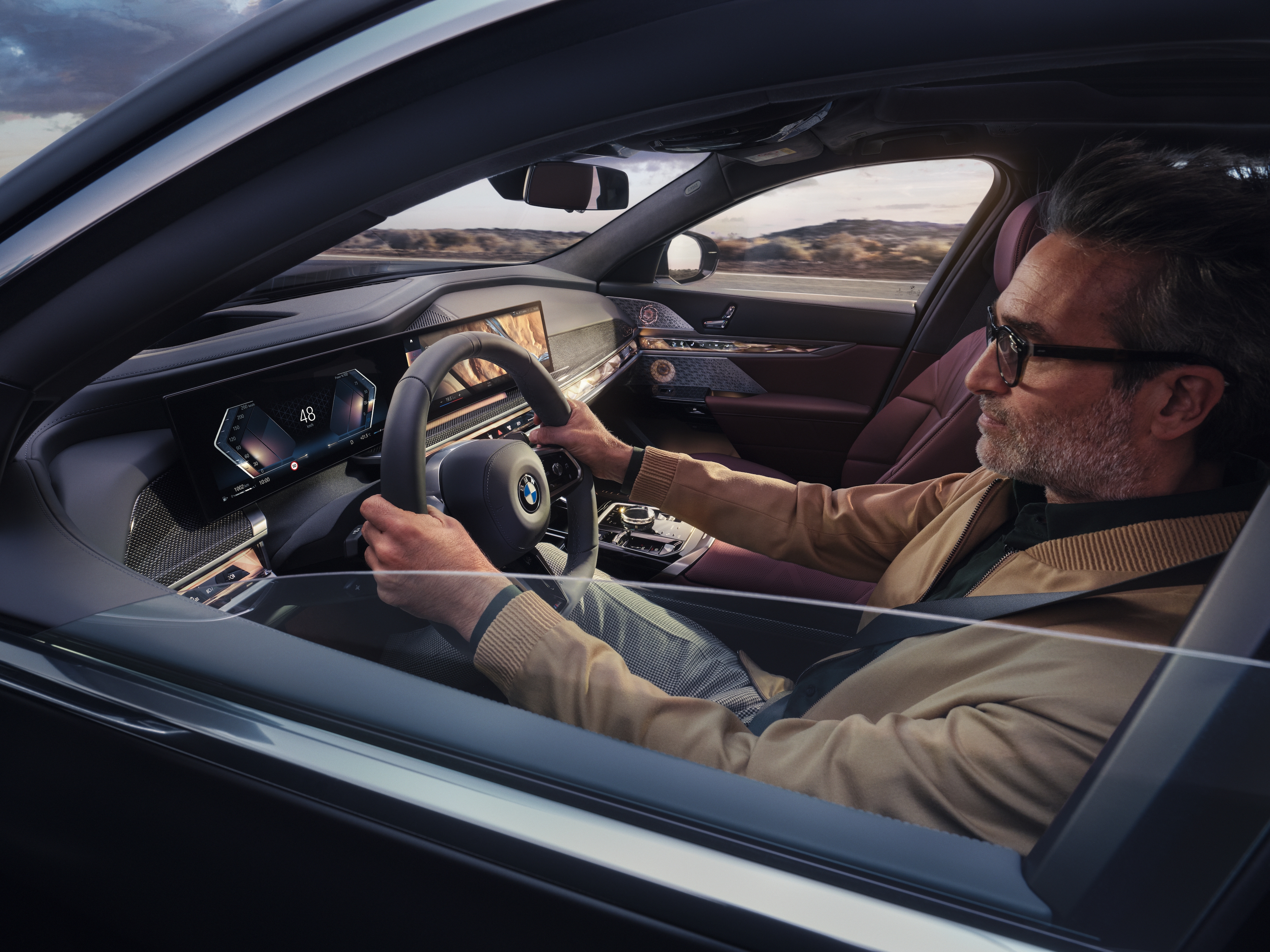 Ein Businesskunde am Steuer eines BMW